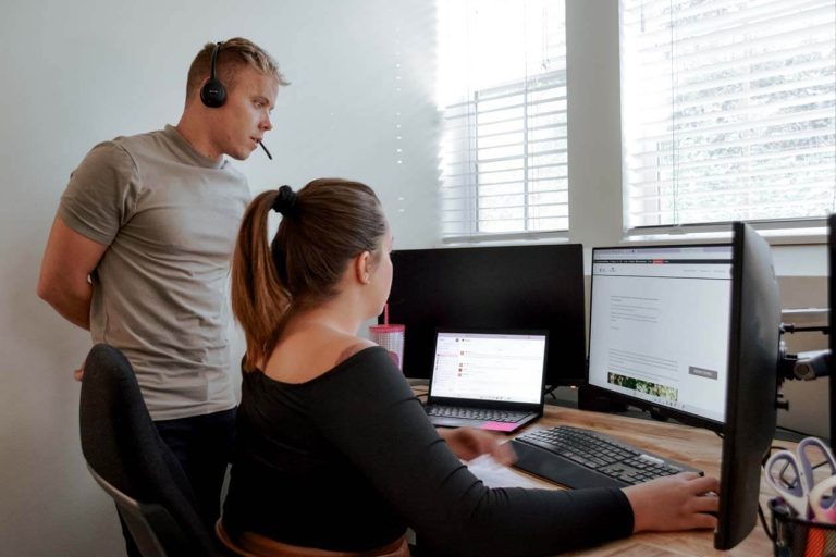 Fluid22 web designers working on development